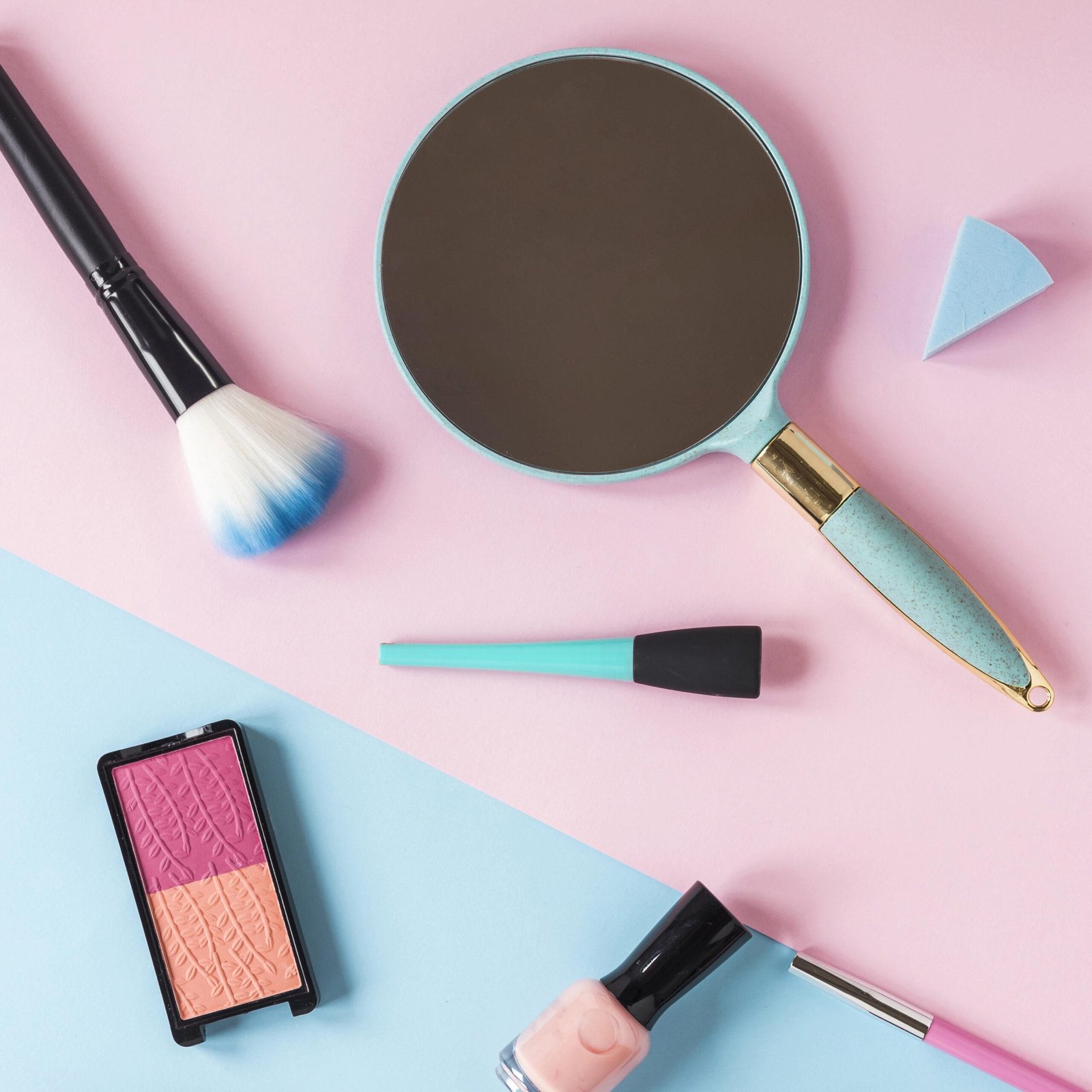 mirror with eye shadows powder brush table scaled